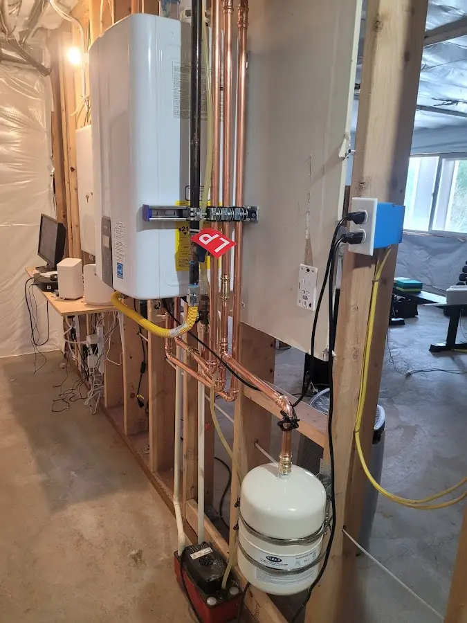 Licensed plumber repairing a kitchen sink in Winter Park